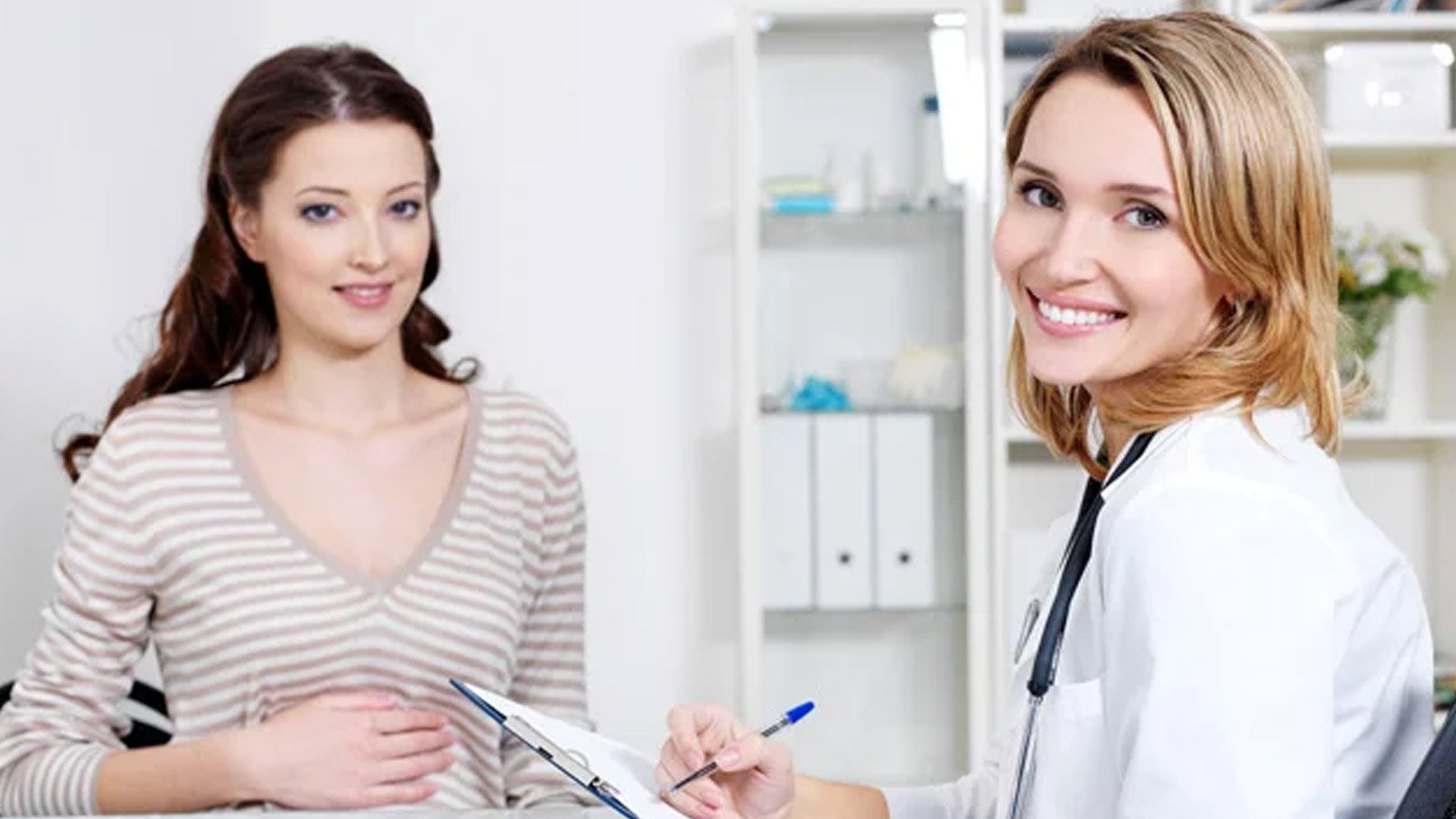 Medical tourism facilitator in India discussing treatment plans with an international patient at a JCI-accredited hospital.”